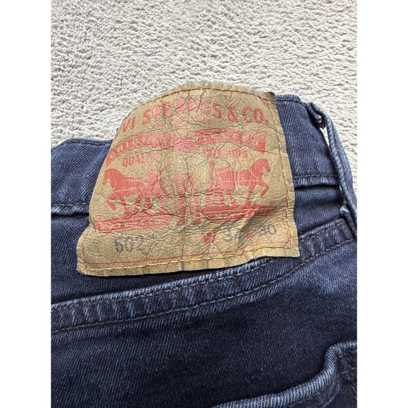 Levis 502 Performance Jeans Mens Dark Wash Blue Straight Stretch Measured 34x27 - Picture 10 of 10